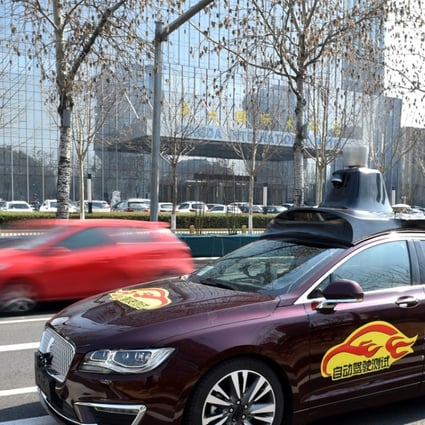 A self-driving vehicle for public road testing runs on a road in Beijing, capital of China. Photo: Xinhua