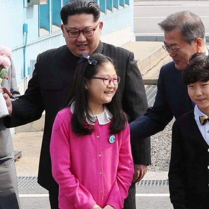 North Korean leader Kim Jong-un and South Korean President Moon Jae-in at the truce village of Panmunjom. Photo: Reuters