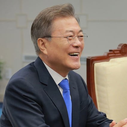 South Korean President Moon Jae-in speaking with North Korean leader Kim Jong-un (unseen) during the inter-Korean summit in the Peace House building on the southern side of the truce village of Panmunjom. This photo was taken on April 27 and released on April 29 by North Korea's Korean Central News Agency (KCNA). Photo: AFP / KCNA via KNS