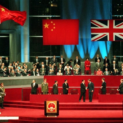 Jiang Zemin shakes hands with Charles, Prince of Wales at the handover ceremony for Hong Kong at midnight on June 30, 1997. Photo: Handout