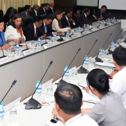 Myanmar's State Counselor Aung San Suu Kyi, center, meets with a UN Security Council team in Naypyidaw, Myanmar, on Monday, in this handout photo made available by the Myanmar’s Ministry of Information (MOI). Photo: EPA-EFE/MOI 