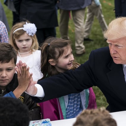 President Donald Trump greets children at the White House on April 2. Speculation is rife about Trump’s mental fitness for office. Photo: Washington Post 