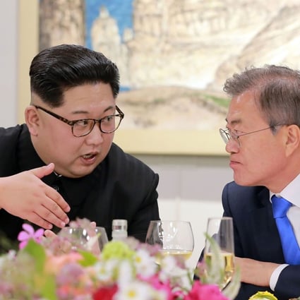This picture taken on April 27, 2018 and released from North Korea's official Korean Central News Agency (KCNA) on April 29, 2018 shows North Korea's leader Kim Jong Un (L) and South Korea's President Moon Jae-in (R) speaking during the official dinner at the end of their historic summit at the truce village of Panmunjom. Photo:AFP/KCNA VIA KNS/STR/ - South Korea