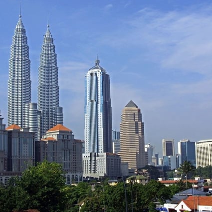 Chinese investors considering Malaysia should limit their property search to either Kuala Lumpur or Penang where end-user demand is more stable and less speculative, according to one analyst. Photo: AFP