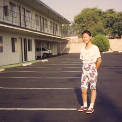A young Kelly Yang outside the motel her parents managed in the US.