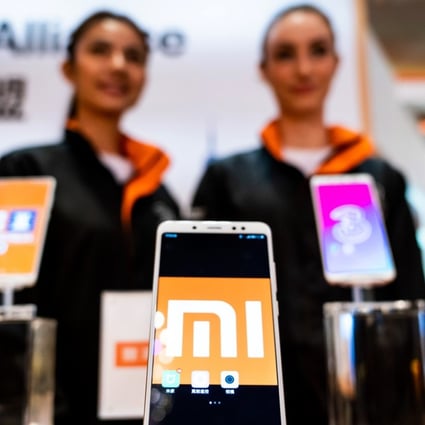 Xiaomi smartphones stand on display during a news conference in Hong Kong on May 3, 2018. The Chinese technology start-up is seeking to invalidate certain patent rights that it allegedly infringed in a lawsuit filed by a unit of rival smartphone maker Coolpad Group. Photo: Bloomberg