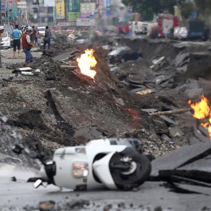 The gas blasts in Kaohsiung in 2014 tore through underground pipelines, sparking massive fires and leaving trenches running down the middle of some streets. Photo: AP