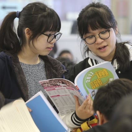 Students sitting the Hong Kong DSE exams do some last-minute revisions, at Kowloon Technical School in Sham Shui Po on April 3, 2017. Photo: Dickson Lee