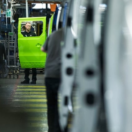 An employee works on the final assembly line at the Vauxhall plant in Luton, Britain, in April. The UK automotive industry, once the joke of British manufacturing, is now one of the jewels in Britain’s industrial crown, employing nearly one million workers. Brexit could change this overnight. Photo: Bloomberg  