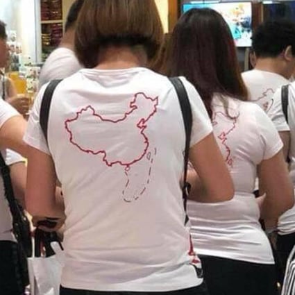 A photo of Chinese tourists wearing T-shirts depicting Beijing’s claims to the disputed South China Sea has sparked online anger in Vietnam. Photo: Twitter