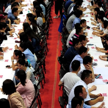 Speed daters chatting during a matchmaking event in Hangzhou. Photo: AFP