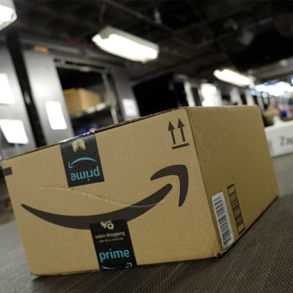 A package from Amazon Prime moves on a conveyor belt at a UPS facility in New York on May 9. Photo: AP