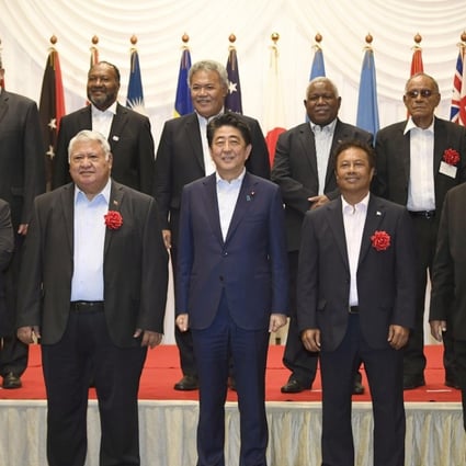 Japanese Prime Minister Shinzo Abe with the leaders of Pacific island countries at their summit in the northeastern Japan city of Iwaki. Photo: Kyodo