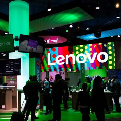 People visit the stand of Lenovo during the Mobile World Congress on the third day of the MWC in Barcelona, on March 1, 2017. Photo: AFP