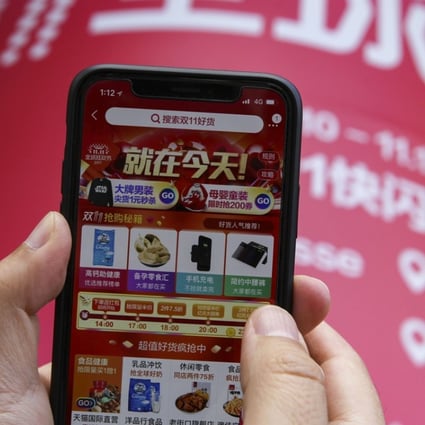 A mobile phone screen shows the Taobao app displaying the Singles' Day shopping festival promotion in November 2017. Photo: Simon Song