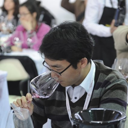 People attend a wine tasting course in Shanghai. Last year, the mainland imported 746 million litres of wine. Photo: AFP
