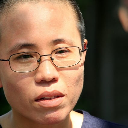 Sources said that Liu Xia, the widow of Nobel Peace Prize winner Liu Xiaobo, was visited by a senior official and close ally of President Xi Jinping and told she might be free within weeks. Photo: Reuters