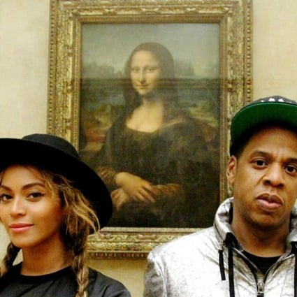 Beyoncé and Jay Z at the Louvre in Paris snapped in front of the Mona Lisa. Photo: Beyonce.com