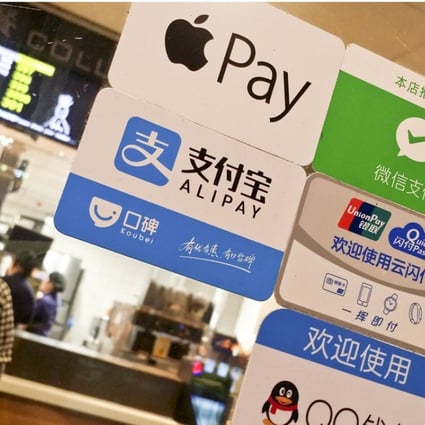 Online payment methods available at a store in China. Banks see such services as a growing threat, but a report says banks can use their position of trust to collaborate with their digital counterparts. Photo: Imaginechina