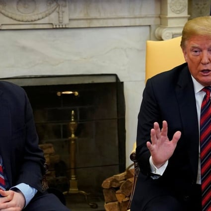 US President Donald Trump talks to the media with Josh Holt, an American missionary who was released by Venezuela, in the Oval Office of the White House. Photo: Reuters