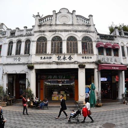 The most well-known style of architecture in Haikou are the arcade houses, or qilou, which are central to the city’s unique cultural identity. Photo: Xinhua/Guo Cheng