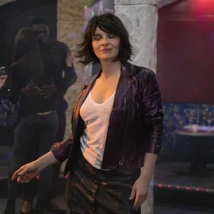 Juliette Binoche in a still from Bright Sunshine In (category IIB, French), directed by Claire Denis and also starring Xavier Beauvois and Gérard Depardieu.