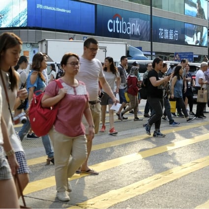 Pay gap Hong Kong women earn more than men before 20 but only half