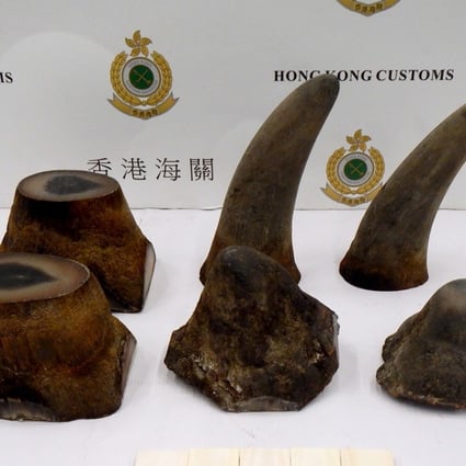 The seized suspected rhino horn and suspected worked ivory at Hong Kong International Airport. Photo: Information Services Department