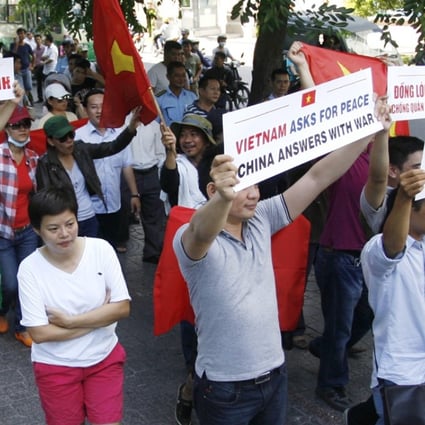 Vietnamese protest against China’s deployment of an oil rig in the disputed South China Sea. Photo: AP
