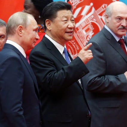 (From left) Vladimir Putin, Xi Jinping, Alexander Lukashenko and Ashraf Ghani take a break at the security summit in Qingdao on Sunday. Photo: EPA-EFE