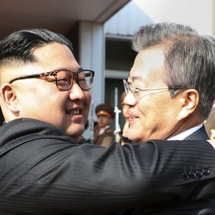 North Korean leader Kim Jong-un and South Korean President Moon Jae-in embrace each other after their meeting at the northern side of the Panmunjom in North Korea on May 26. Photo: AP