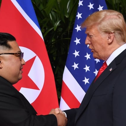 North Korean leader Kim Jong-un with US President Donald Trump at the start of their historic summit, at the Capella Hotel on Sentosa Island, Singapore. Photo: Agence France-Presse