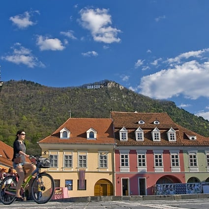 Baroque, gothic and renaissance architecture sit side-by-side in Brasov, which also boasts a Hollywood-style sign in the hills. Picture: Tim Pile