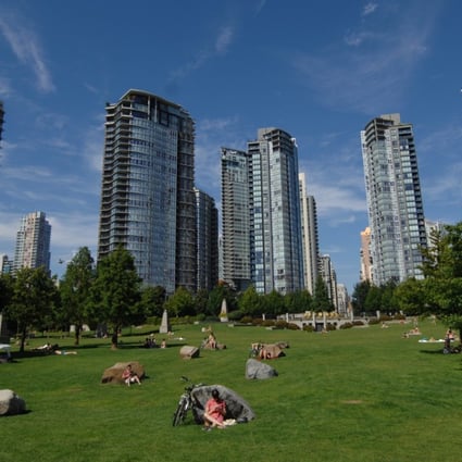 People enjoy the sunny weather in the Yaletown area in Vancouver, Canada, in January 2015. A report from two years ago estimated that at least 10 per cent of the Hong Kong Chinese diaspora are moving back to Canada. Photo: Xinhua