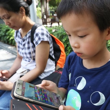 Smartphone addiction is a particular problem when it comes to children, something that both Apple and Google are trying to address with their new features. Photo: Edward Wong