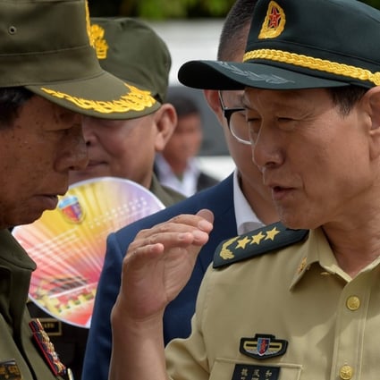 China's defence minister Wei Fenghe (right) speaks to Cambodia's defence minister Tea Banh during a visit to a military exhibition in Phnom Penh. Photo: AFP
