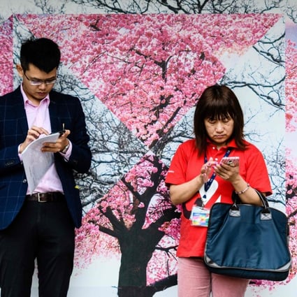 Hong Kong has one of the world’s highest mobile phone usage rates at 248 per cent, according to government data released in February. Photo: AFP