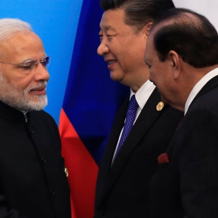 A handshake between Indian Prime Minister Narendra Modi and Pakistani President Mamnoon Hussain was one of the big moments at the Shanghai Cooperation Organisation summit in Qingdao. Photo: Reuters