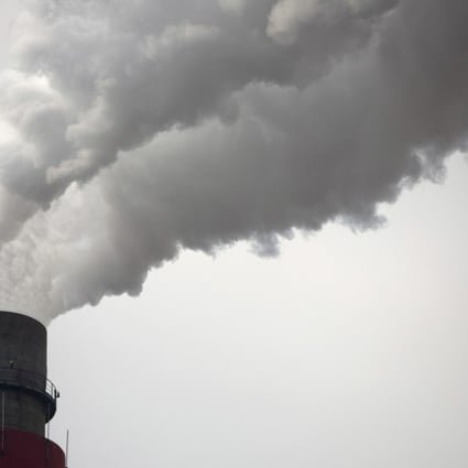 Smoke and steam rise from the smokestack of a coal-fired power plant in northern China. According to a new study by American researchers, sulphur dioxide emissions at 256 coal-fired plants in China have dropped by nearly 14 per cent in response to a new anti-pollution law. Photo: AP