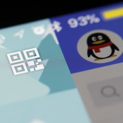 While the Chinese government has its own chat system for dealers, more than 70 per cent of bond trades are now conducted over personal messaging accounts such as Tencent Holdings’ QQ messaging service. Photo: Bloomberg