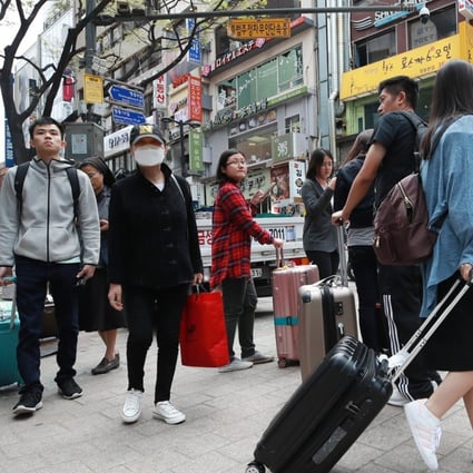 Chinese tourists on Myeongdong Street in downtown Seoul on 13 April 2018. According to the finance ministry, the number of Chinese tourists visiting the country showed a 13.3 per cent increase on-year in March. Photo: EPA-EFE