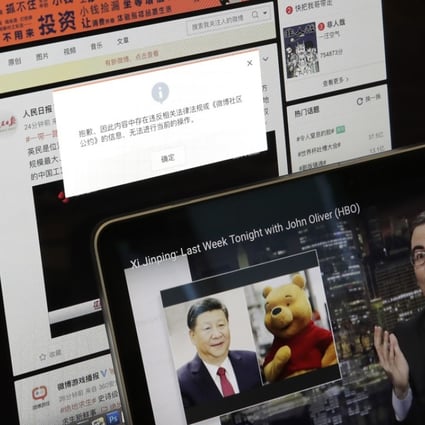 Authorities blocked HBO’s website in China so users just get an error message saying the content violates laws and regulations (rear screen) days after British comedian John Oliver took Chinese President Xi Jinping to task. Photo: AP