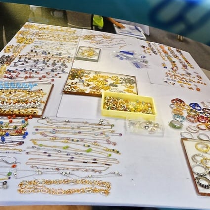 Police said the items comprise 12,000 pieces of jewellery, 567 handbags, 423 watches and 234 sunglasses. Photo: EPA