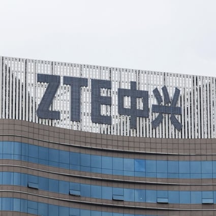 Signage is displayed atop the ZTE Corp. headquarters in Shenzhen, China. The Senate voted Monday to reinstate punitive measures against the Chinese telecom giant. MUST CREDIT : Bloomberg photo by Giulia Marchi