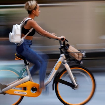 A commuter on an oBike in Singapore. Photo: Reuters