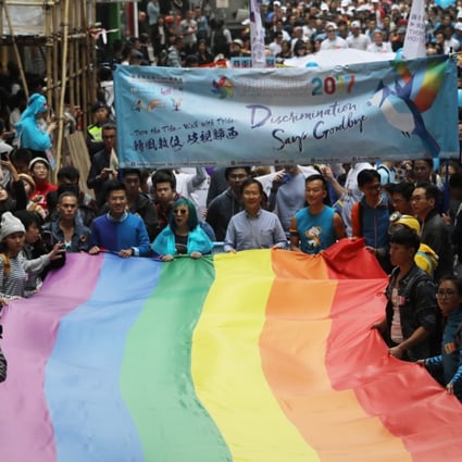 The Hong Kong Pride Parade 2017 passes through Causeway Bay, on November 25. When homosexuality was decriminalised in 1991, the gay community was full of hope about a sexually inclusive future but, 27 years on, the lack of an anti-discrimination law still leaves those of alternative sexual orientations as targets of abuse. Photo: Edward Wong