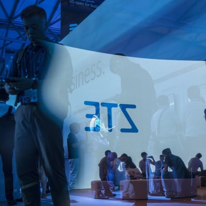 The ZTE logo projected on a screen is reflected on a pane of glass at the Ericsson AB booth at the Mobile World Congress Shanghai on June 28, 2018. Photo: Bloomberg