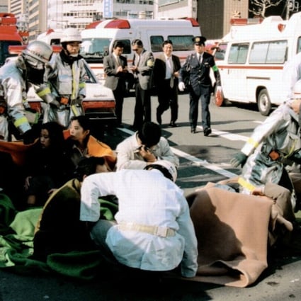 Patients receive treatment in front of Tsukiji Station, in Tokyo, on March 20, 1995, after a sarin gas attack by the Aum Shinrikyo cult. Picture: Kyodo