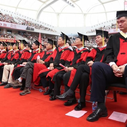 Chinese basketball legend Yao Ming attends the graduation ceremony after earning his degree in economics from Shanghai University. Photo: Twitter