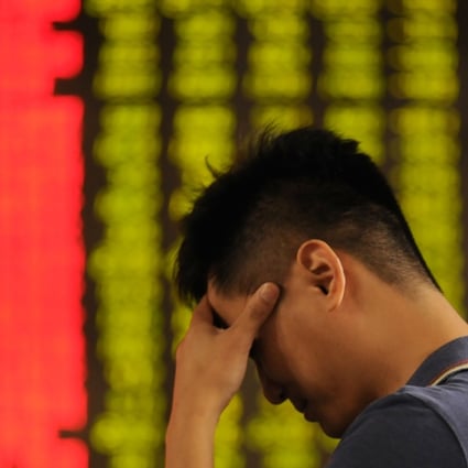A man appears dejected at a stock exchange in Xingtai, in north China’s Hebei province, on June 19. Chinese stocks have had a rough run over the past two weeks, amid the US-China trade tensions. Photo: Xinhua
